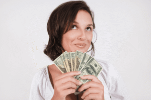 woman holding money